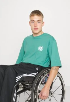 YOURTURN UNISEX - T-Shirt Print - Green -Kleidung Rabatte Geschäft c4ee4c172e4a46e4ad5113d156b0c0d5